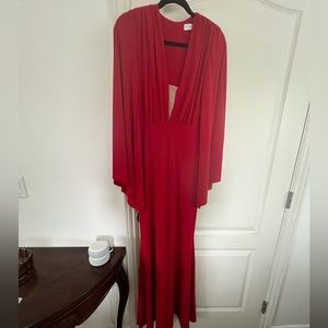 Red gown jersey material with bell sleeves